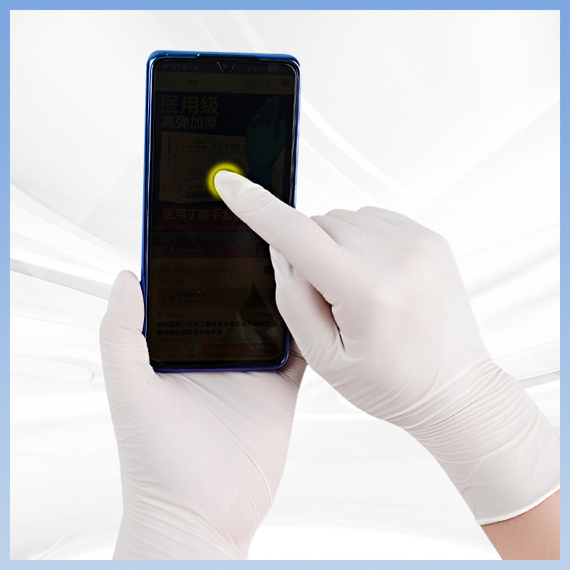 Guantes de látex blanco con agarre antideslizante Guantes de látex desechables para un manejo seguro